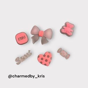 64. Pink Croc charms